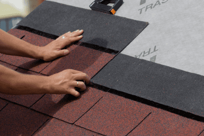 installing-roofing-on-house