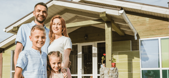 Happy-Family-In-Front-of-New-Roof